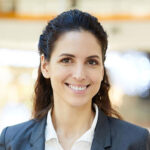 successful-female-broker-headshot-YPEHMWD-150x150